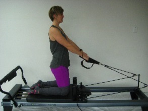 kneeling high row